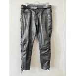 A pair of ZAF Bikerwears leather trousers, featuring adjustble cross lacing from the hips down the