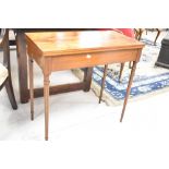 A reproduction Regency style fold over games table, approx. width 76cm, 38cm deep opening to 76cm
