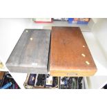 A collection of two vintage construction sets housed in wooden cases, including a branded Meccano