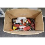 An assortment of vintage construction toy components, primarily attributed to the manufacturer Mecc