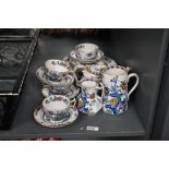 An early 20th-century Booths Silicon china 'Pompadour' tea set, to feature hand painted floral and