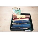 A selection of fountain pens, ballpoint pen and pencil. A Boxed Parker Duofold in grey, Parker