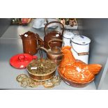 A quantity of vintage kitchenalia, to include a brown glazed hen on egg; a French-style white enamel