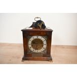 An early 20th-century Westminster chime burr walnut case bracket clock, featuring an etched brass