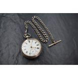 A Victorian silver T. Dowell Millom open face top wound pocket watch, the white dial having Roman