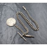 A silver graduated watch chain, having an Afrikaans Shilling coin, T-bar, watch key and dog clip,