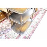 A dark stain Ercol three tier tea trolley, approx. 72 x 44cm