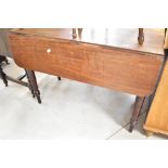 A Victorian mahogany Pembroke style dining table on turned legs, width approx.97cm