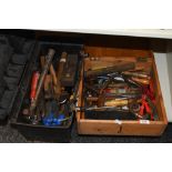 A selection of various mixed small hand tools contained in a pine box and modern plastic tool box,