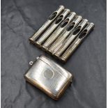 An Edwardian silver novelty cigarette holder, modelled as a rifle magazine, marks for Birmingham