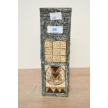 A vintage Troika Pottery (1963-1983) coffin vase after Louise Jinks, having a textured beige,