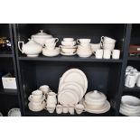 A vintage Wedgwood of Etruria and Barlaston part tea and dinner service, featuring deep red