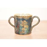 A fine early 20th-century Daisy Makeing-Jones (1881-1945) for Wedgwood lustre loving cup/tyg, having