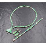 A Mexican silver synthetic opal set suite of jewellery, comprising necklace, bracelet and drop