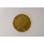 A George III 1790 Gold Guinea, Fifth Laureate Head, Rev Spade Shaped Shield. Weight 8.35 Grams