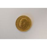 A George V 1914 Gold Half Sovereign, Royal Mint, Rev George And Dragon, Weight 4.00 Grams.