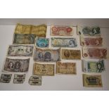 A Collection Of British And World Banknotes. British Comprising, One Pound Series C, J B Page.