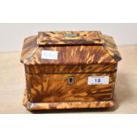A fine 19th-century British Regency faux blonde tortoiseshell-veneered tea caddy of pagoda form,