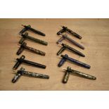 Ten various fountain pens including advertising examples and Burnham