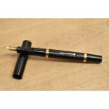 A Mabie Todd & Co Blackbird lever fill fountain pen in Black with two barrel bands having