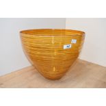 A large contemporary Bob Crooks (British b.1965) art glass 'Bound Bowl', featuring vibrant orange