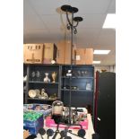 Two vintage wrought iron wall sconces, featuring minimalist arm detailing; sold with a tall