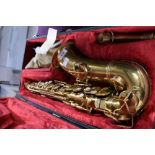 An Alto Saxophone , stamped CG Conn for Elkhart, in fitted case
