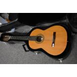 An Admira 1000E classical guitar, in semi hard case
