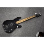 A bass guitar, Fender Precision style, in black