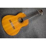 A Yamaha classical guitar, C40, having Roksak case