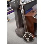 A traditional Indian Tanpura, complete with case, labelled for Radhey Shyam Sharma & Bros. From