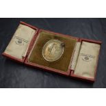 A 9ct gold 'The Confectioners Bakers and Allied Trades Exhibition London' presentation medallion,