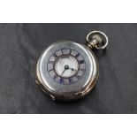 A silver Omega side wound Half Hunter pocket watch, movement no:7781868 having an Arabic numeral