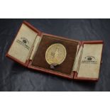 A 9ct gold 'The Confectioners Bakers and Allied Trades Exhibition London' presentation medallion,