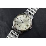 An Omega Tool 9070 wristwatch, the silver tone dial having baton five minute markers and date