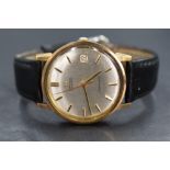 A 9ct gold Omega automatic Seamaster wristwatch, the champagne dial having baton five minute markers