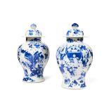 A LARGE PAIR OF CHINESE BLUE AND WHITE 'HUNDRED BOYS' VASES AND COVERS, QING DYNASTY, 18TH CENTURY