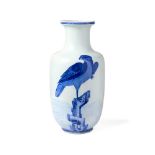 A CHINESE BLUE AND WHITE 'BIRD OF PREY' ROULEAU VASE, QING DYNASTY 18TH CENTURY