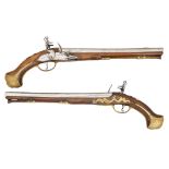 TWO EUROPEAN 16 BORE FLINTLOCK HOLSTER PISTOLS ALMOST FORMING A PAIR SIGNED I.I. BEHR