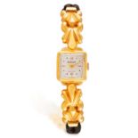 A LADY'S 18K GOLD COCKTAIL WATCH, CIRCA 1940 • Manual wind movement • square silvered dial • Arabic