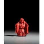 A TSUISHU (CARVED RED-LACQUER) NESUKE OF A SHOJO NOH DANCER Japan, 19th century, late Edo or Meiji