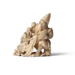 *AN IVORY OKIMONO OF A KIMONO-CLAD MONKEY BATTLING A BAT Japan, Meiji period H.7.