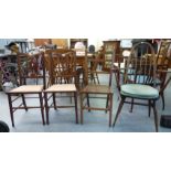 Four chairs, viz. a pair of Art Nouveau mahogany framed, splat back chairs; an oak framed example