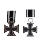 A German First World War Iron Cross 2nd Class 1914; and another