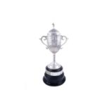 A late Victorian silver trophy cup and cover