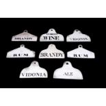 Eight 19th Century pottery bin labels