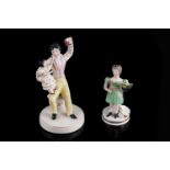 Staffordshire figure 'Happy Family'; and another