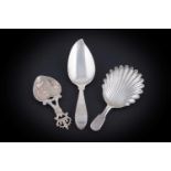 A George III Scottish provincial silver caddy spoon; and two others