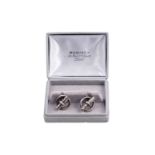 A pair of Hermès silver cufflinks