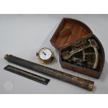 An antique brass octant by A. Dobbie of Glasgow, with silvered scale, in fitted mahogany case with